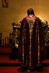 Image showing priest in the altar