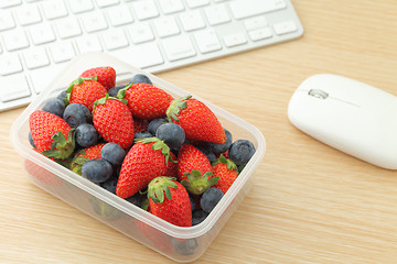 Image showing Healthy lunch box in working desk