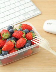 Image showing Healthy lunch box in working desk