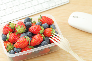 Image showing Berry mix lunch box at office