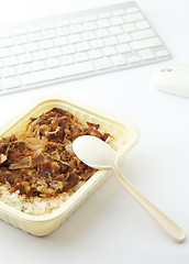 Image showing Unhealthy lunch at office