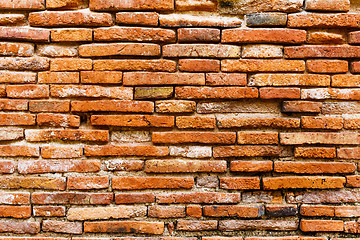 Image showing Ancient brick wall in red color