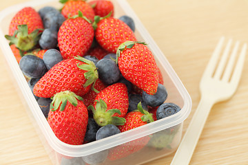 Image showing Strawberry and blueberry mix in plastic box