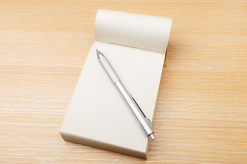 Image showing Memo pad and pen