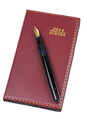 Image showing Leather notebook and pen isolated 