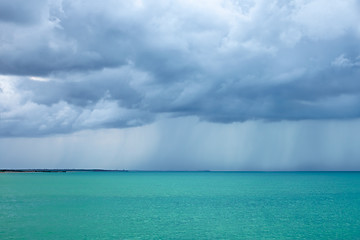 Image showing Cumulonimbus clouds over the turquoise sea