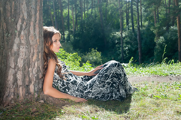 Image showing Pretty girl under tree