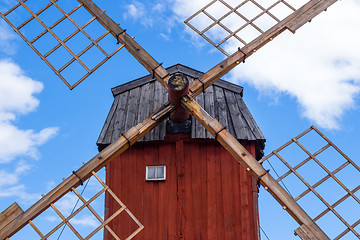 Image showing Red wooden windmill