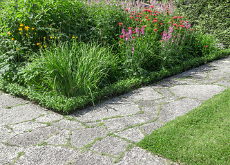 Image showing Stone paths in a sunny garden