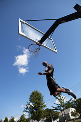 Image showing Slam Dunking a Basketball