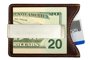 Image showing Dollars in money clip and credit card.