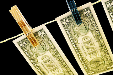 Image showing Dollars on the wire