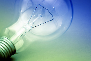 Image showing Background with lit lightbulb