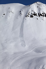 Image showing Off piste slope with trace of skis, snowboarding and avalanche