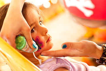 Image showing Cute Girl Gets A Face Painting At A Party