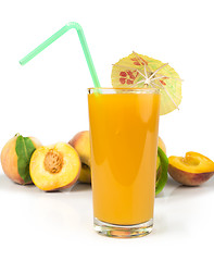 Image showing Peaches and glass with juice