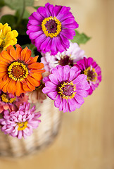 Image showing Beautiful flowers in a basket