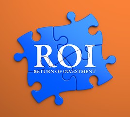 Image showing ROI on Blue Puzzle Pieces. Business Concept.