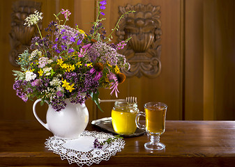 Image showing Still life from medicinal herbs, honey, herbal tea