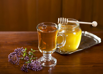 Image showing Still life from medicinal herbs, honey, herbal tea