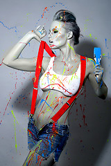 Image showing Female House Painter Splattered with Latex Paint