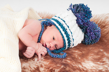 Image showing Newborn baby in hat with pom-pom