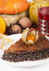 Image showing poppy pie, autumn leaves and pumpkins