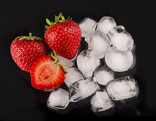 Image showing Ice cubes isolated on black