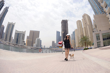 Image showing beautiful woman goes in shopping