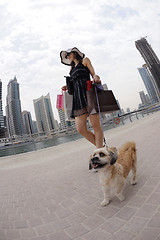 Image showing beautiful woman goes in shopping