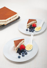 Image showing tiramisu dessert with berries and cream