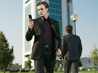 Image showing Businessman working near office aa