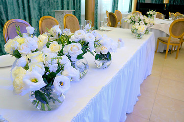 Image showing Tables decorated with flowers