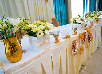 Image showing Tables decorated with flowers