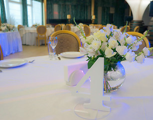 Image showing Tables decorated with flowers