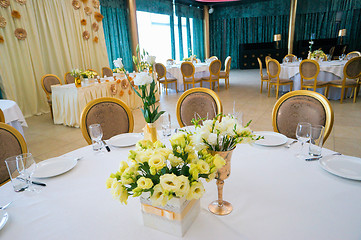 Image showing Tables decorated with flowers