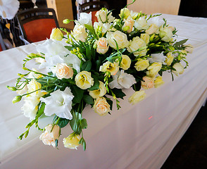 Image showing Tables decorated with flowers