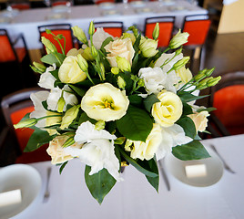 Image showing Tables decorated with flowers