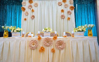 Image showing Tables decorated with flowers