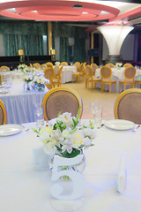 Image showing Tables decorated with flowers