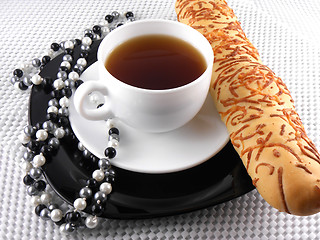 Image showing breakfast with coffee cup, sweet bread and diamond