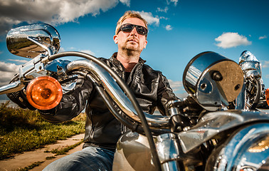 Image showing Biker on a motorcycle