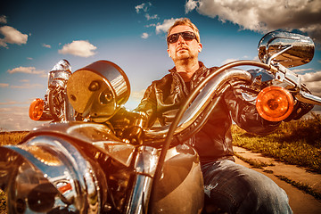 Image showing Biker on a motorcycle