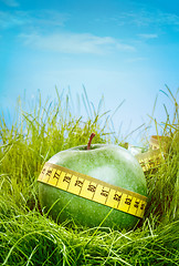 Image showing apple and measuring tape