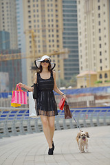 Image showing beautiful woman goes in shopping