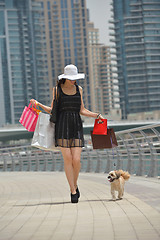 Image showing beautiful woman goes in shopping