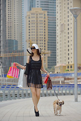 Image showing beautiful woman goes in shopping