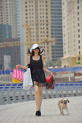 Image showing beautiful woman goes in shopping