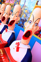 Image showing Side show carnival clowns with mouths open ready for play