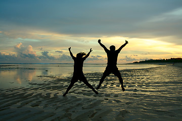 Image showing Happy jumping people